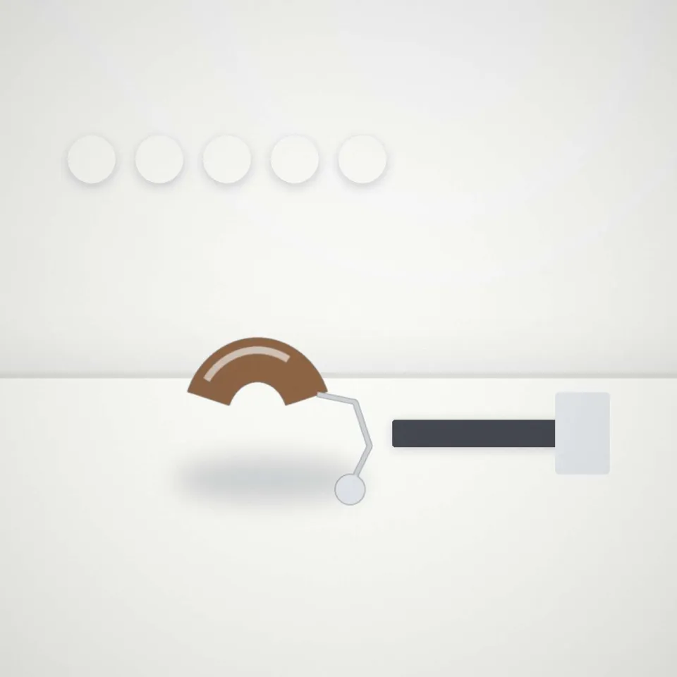 Appareil auditif en cours de nettoyage avec brossette et filtres de rechange