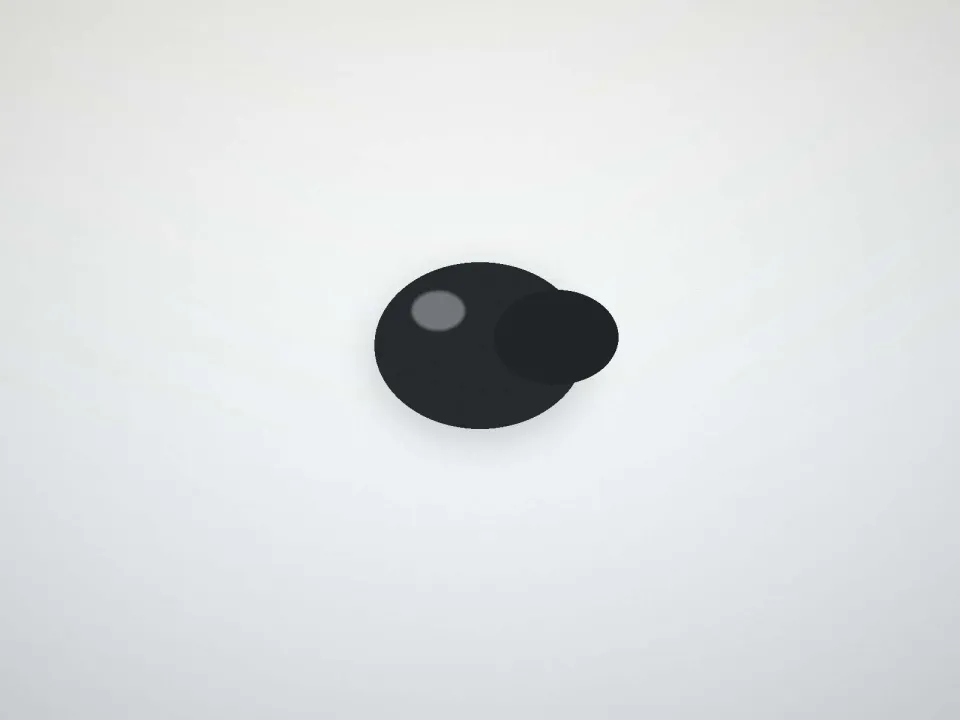 Petit appareil intra-auriculaire noir, posé sur un présentoir clair (modèle d'exemple, sans marque)