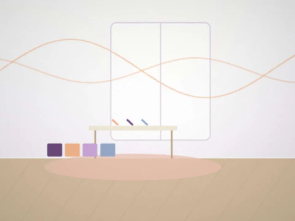 Petite table, crayons et jeux dans l'espace enfants du cabinet