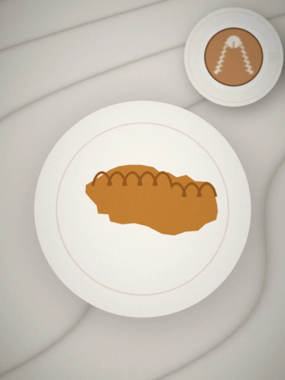 Viennoiserie dorée sur une assiette, à côté d'un café
