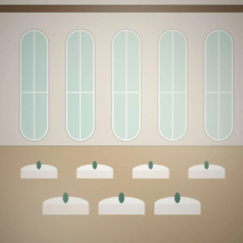 Grande salle en journée, tables rondes et fenêtres sur le parc