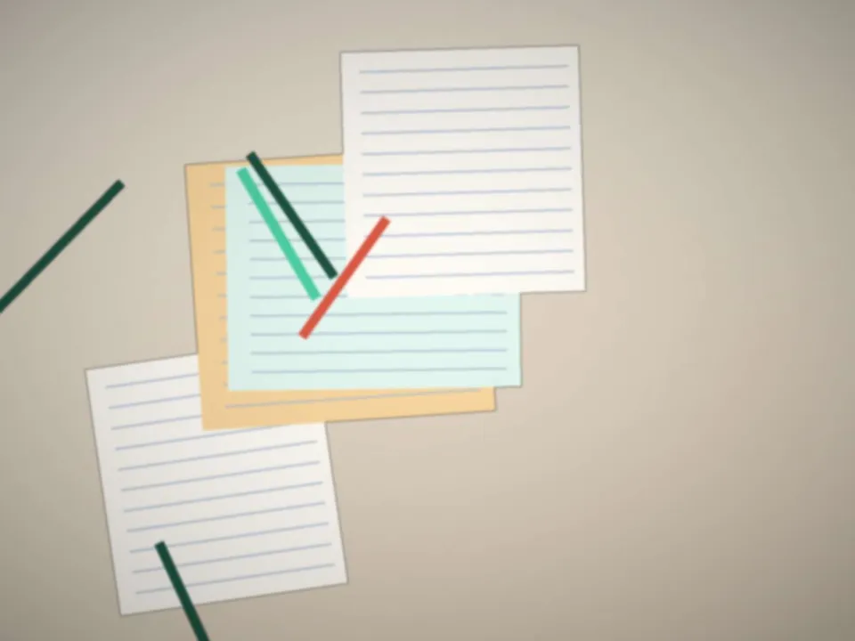 Cahier et feuille d'exercices sur une table, pendant un cours particulier