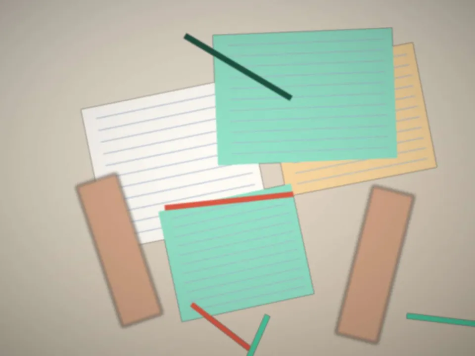 Mains d'un élève qui écrit dans son cahier, sans visage