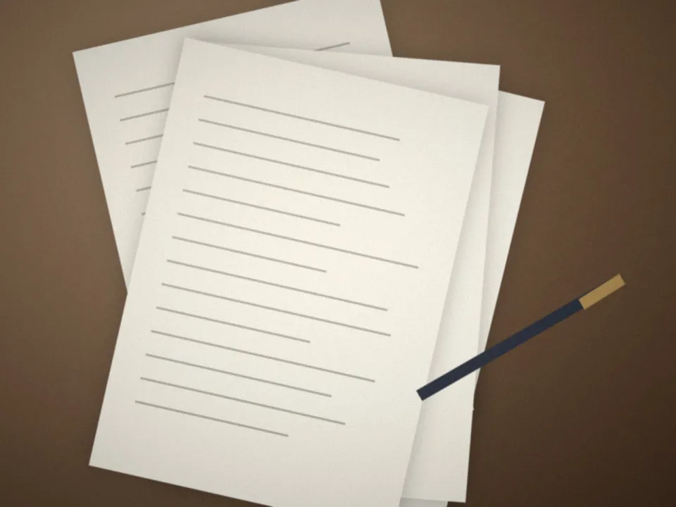Documents et stylo posés sur une table en bois