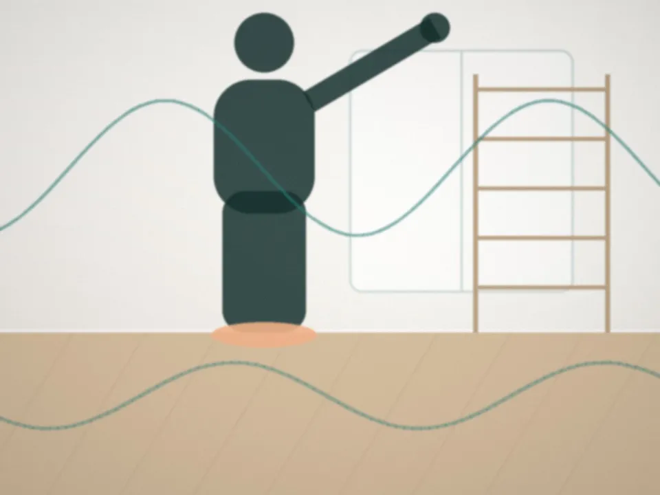 Exercice d'équilibre sur un plateau instable, en salle de rééducation