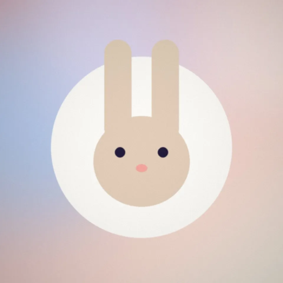 Un lapin nain dans les mains d'une auxiliaire vétérinaire