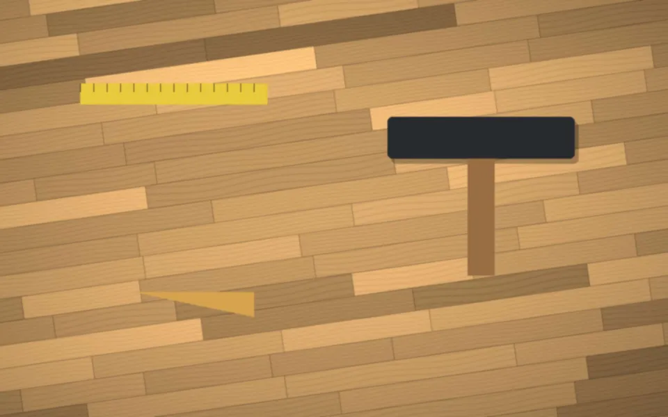 Pose d'une lame de parquet au maillet et à la cale de frappe
