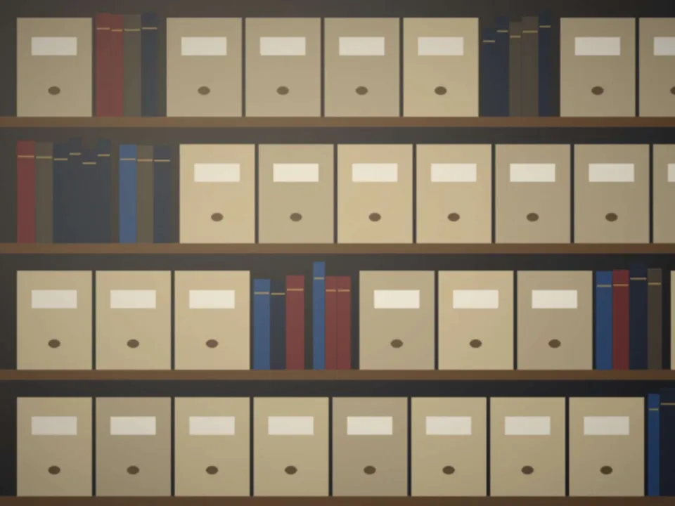 Rayonnages des archives de l'étude, boîtes et registres reliés