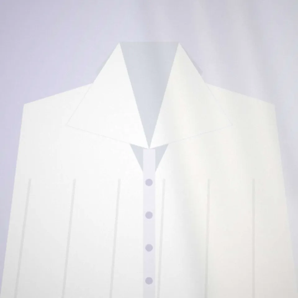 Chemise blanche repassée, col et poignets impeccables, en gros plan