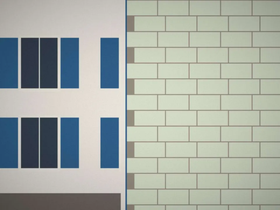 Panneaux isolants posés sur un mur avant l'enduit de finition
