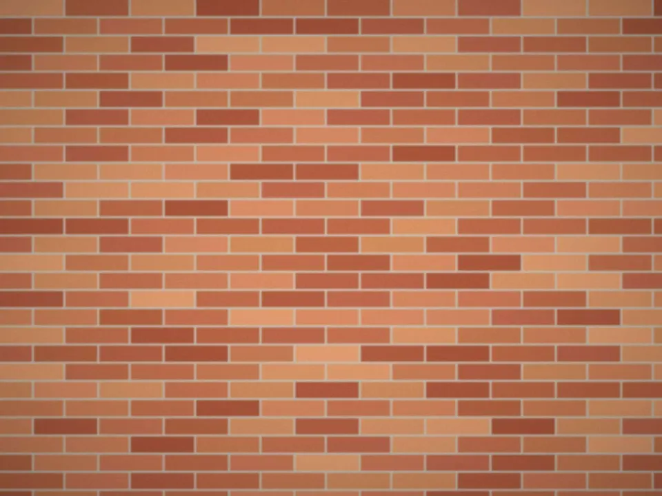Mur en brique foraine monté avec des joints réguliers