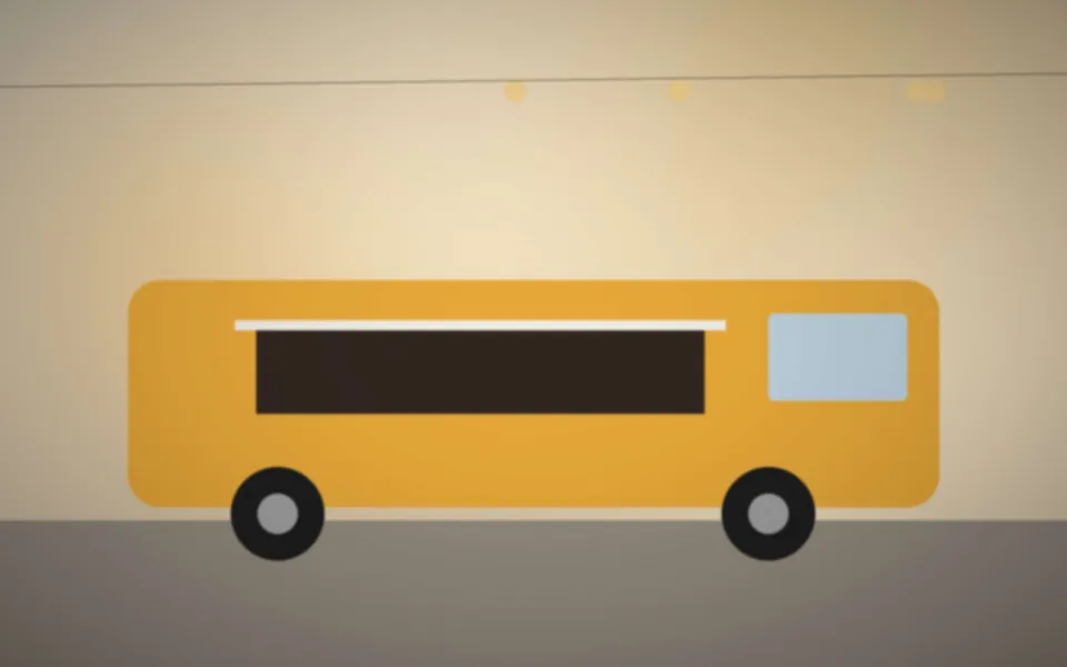 Le camion installé sur un marché, auvent déplié et tables pliantes