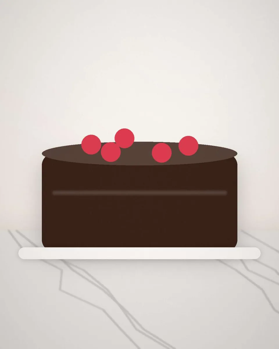 Entremets au chocolat glacé, décoré de framboises