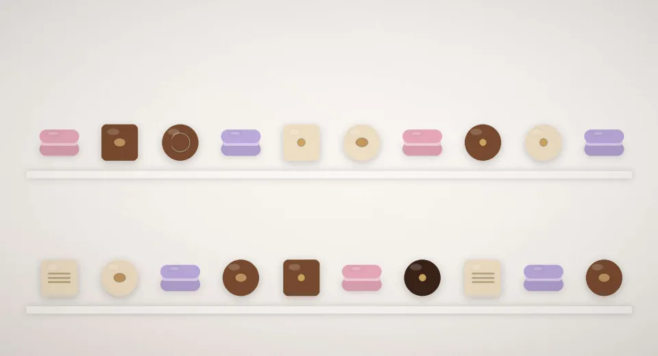 La vitrine de la boutique : bonbons de chocolat et macarons alignés