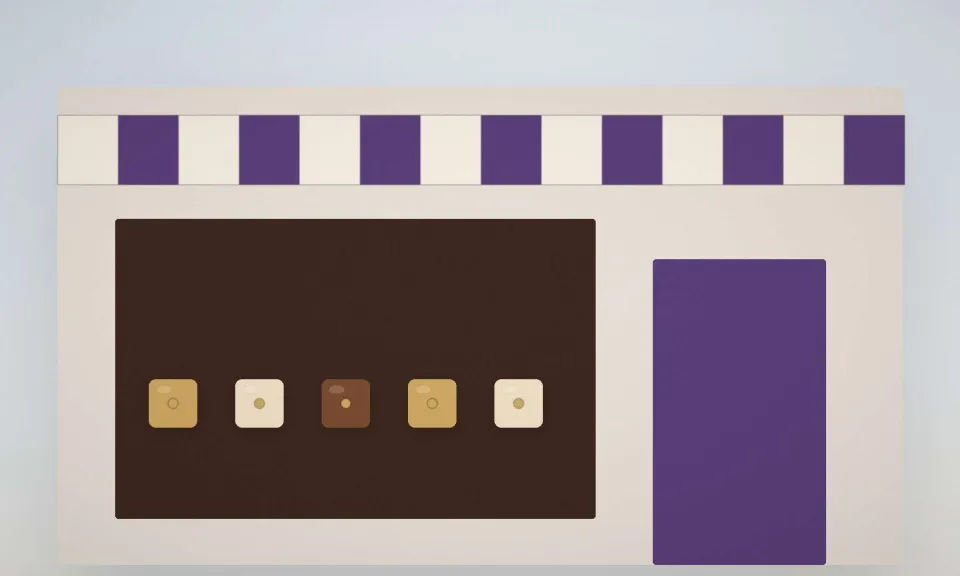 La devanture de la chocolaterie, vitrine éclairée et store aux couleurs de la maison
